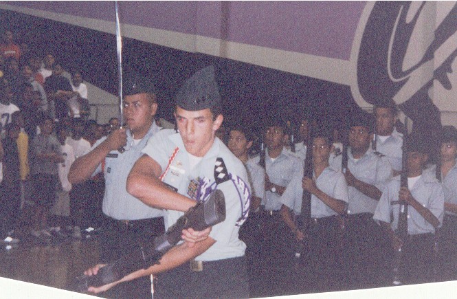 Ryan Clarque performing with ROTC at Pep Assembly